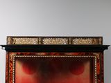 a picture of a picture of a man sitting on a couch