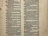 un vieux livre dont une page comporte des notes manuscrites