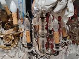 a chandelier that has a lot of glass hanging from it
