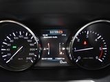 a close up of a car dashboard with various gauges