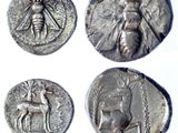 four ancient silver coins with images of people and animals on them