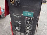 a machine that is sitting on the ground in the parking lot