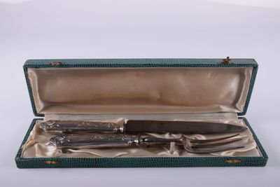 Couvert à découper en argent fourré lame acier dans un coffr…