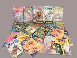 a lot of comic books that are on the table