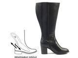 the heel of a woman ' s black boots with a heel cut out
