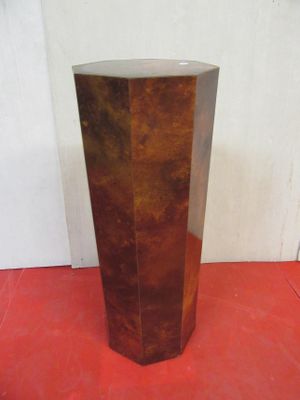 a vase that is sitting on a red floor