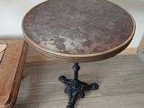 a small table that is sitting on a wooden floor