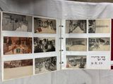 an open book with pictures of people on it sitting on a table
