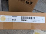 packaging of a box with a barcode on it sitting on the ground