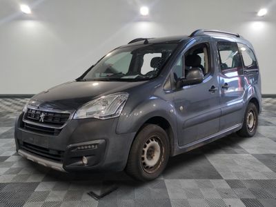 a grey van that is parked on a checkered floor