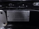 a close up of a metal plate on the back of a motorcycle