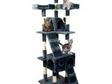 a cat tree with three cats sitting on top of it