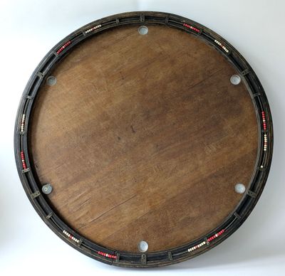 a wooden table with a clock on top of it