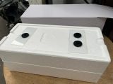 a white box with two black knobs on it
