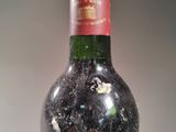 a bottle of wine that is sitting on a table