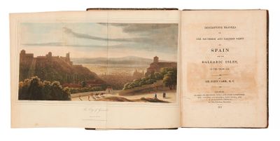 un livre ouvert avec l'image d'un château en arrière-plan