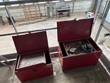 two red boxes that are sitting on the floor