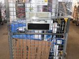 a shopping cart with a microwave on top of it