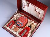 a red box with a set of items in it