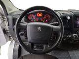 a steering wheel and dashboard of a truck