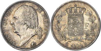 a close up of a coin with a crown on it
