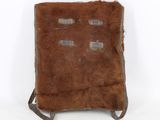 an image of a small brown bag with a brown fur on it
