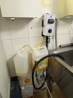 a kitchen with a sink and a faucet in it