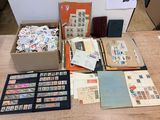 many different types of stamps on the table
