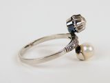sterling silver ring with pearl and blue topaz stone