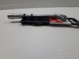 a black and red tool that is on a table
