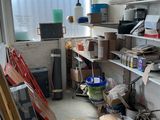 a room filled with lots of clutter and boxes