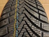 a close up of a tire with a yellow line on it