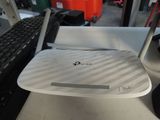 an image of a wireless router sitting on a desk