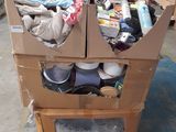 a cardboard box that has a bunch of items inside of it