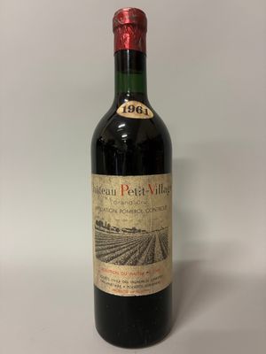 a bottle of wine that is sitting on a table