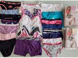 a lot of underwear that are laying out on a table