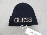 guess beanie hat in black with gold logo