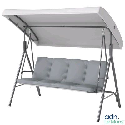 the swing chair is white and has a canopy over it