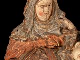 an image of a statue of a woman holding a child