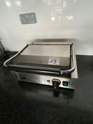 an electric grill with a number on it in a kitchen