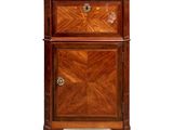 an image of a wooden cabinet with a marble top