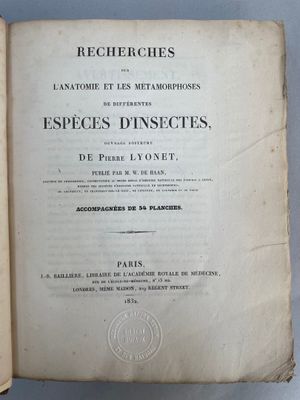an open book with a black and white title on it