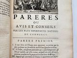 an open book with a picture of a group of people on it
