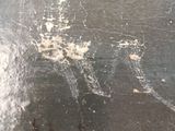 a close up of a painting of a man riding a skateboard