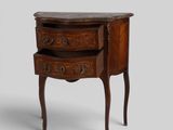 a small wooden table with two drawers on top of it