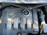 the engine of a car with its hood open and the hood up