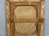 an old wooden picture frame with a rope hanging from it ' s sides