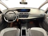 a picture of a car dashboard with a steering wheel