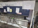 a large machine that is sitting in a garage