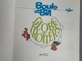 an open book with a picture of a cartoon character on it